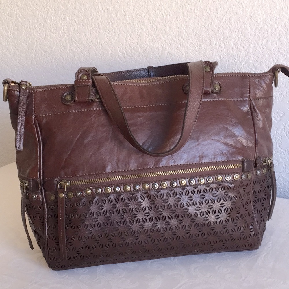Angel by L. Matino laser cut studded leather tote